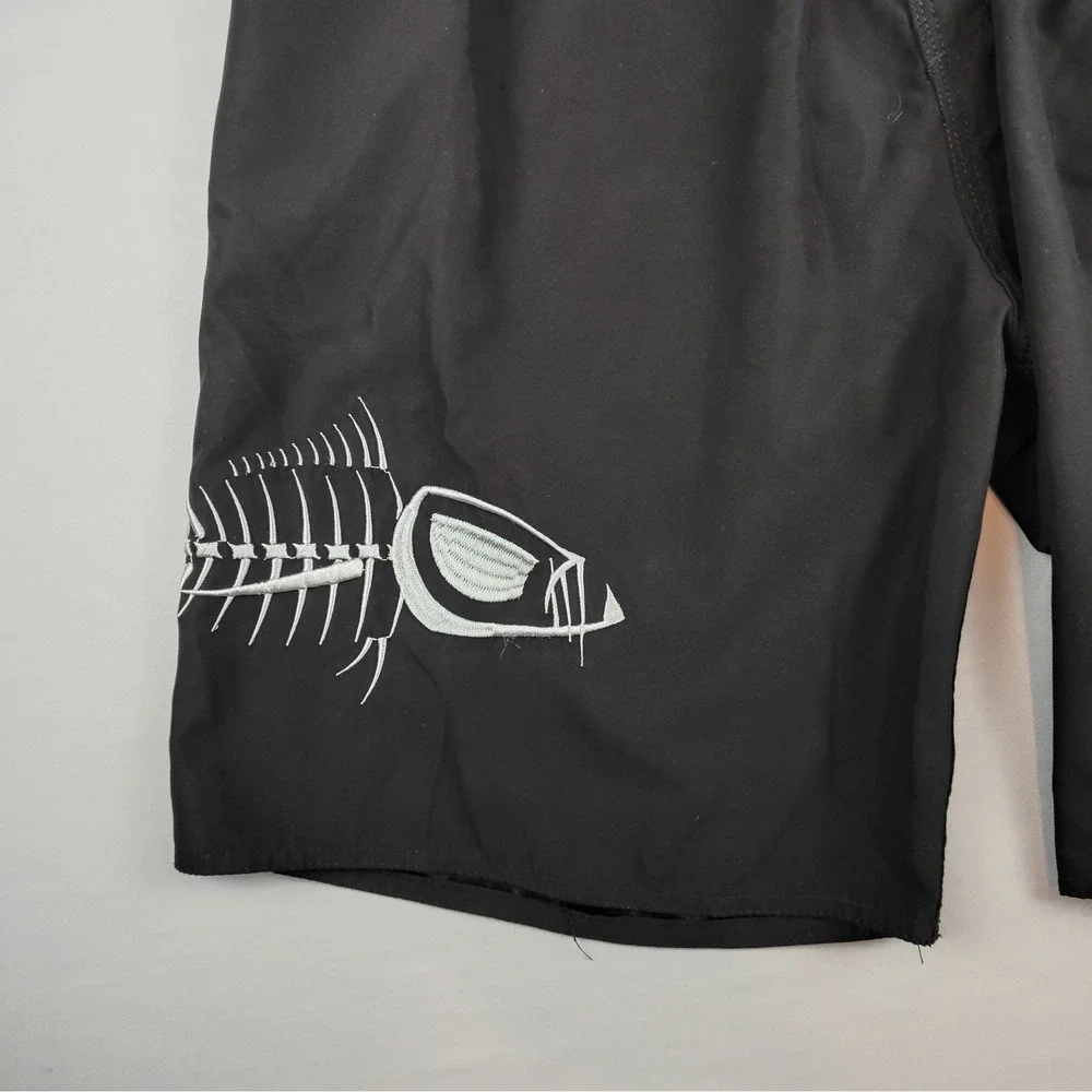 Tormenter Mens Size 38 Board Shorts Swim Trunks Black Fish Skeleton Graphic
